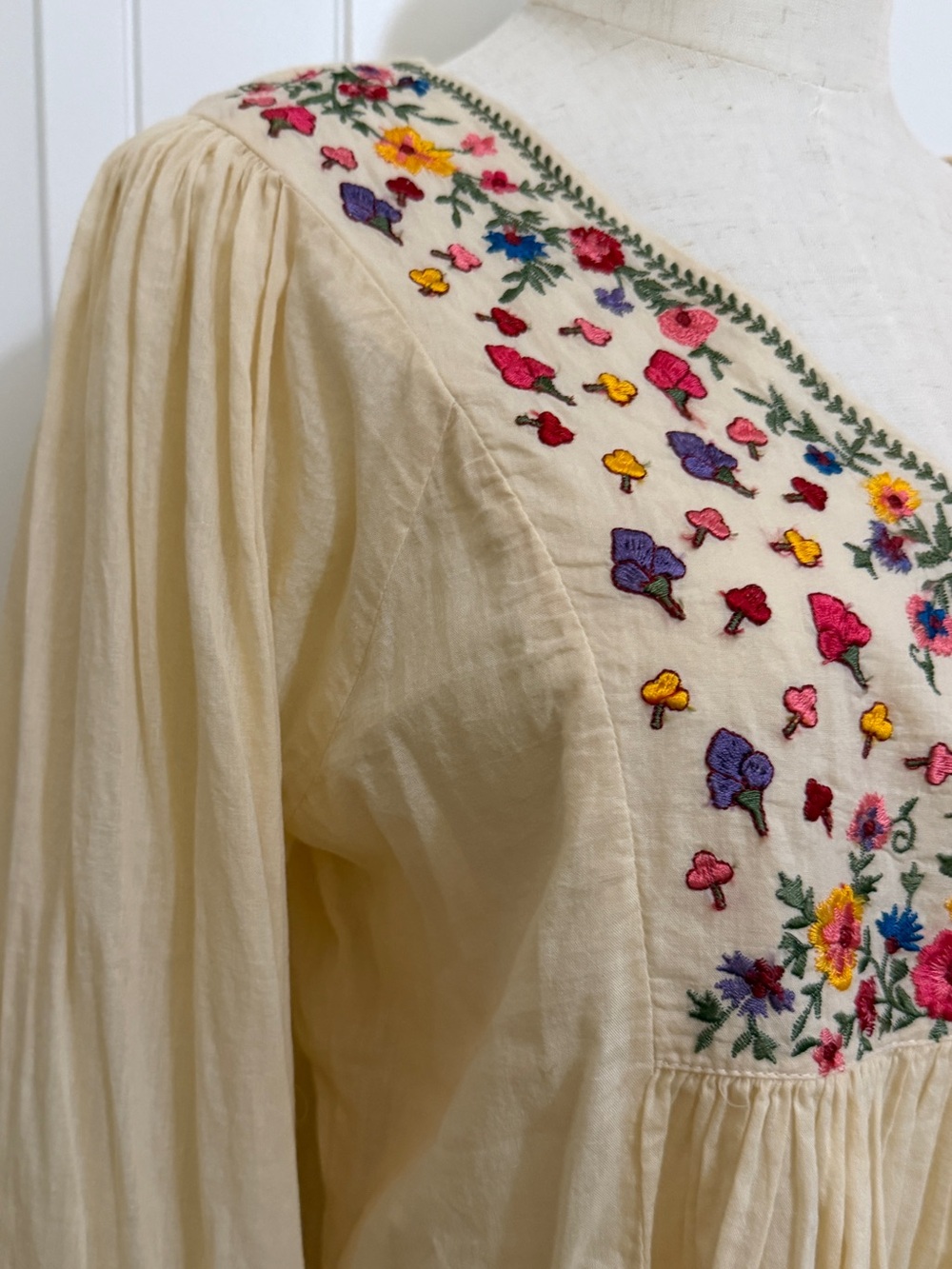Cream Embroidered Peasant Blouse with Colorful Floral Detail - Picture 12 of 17